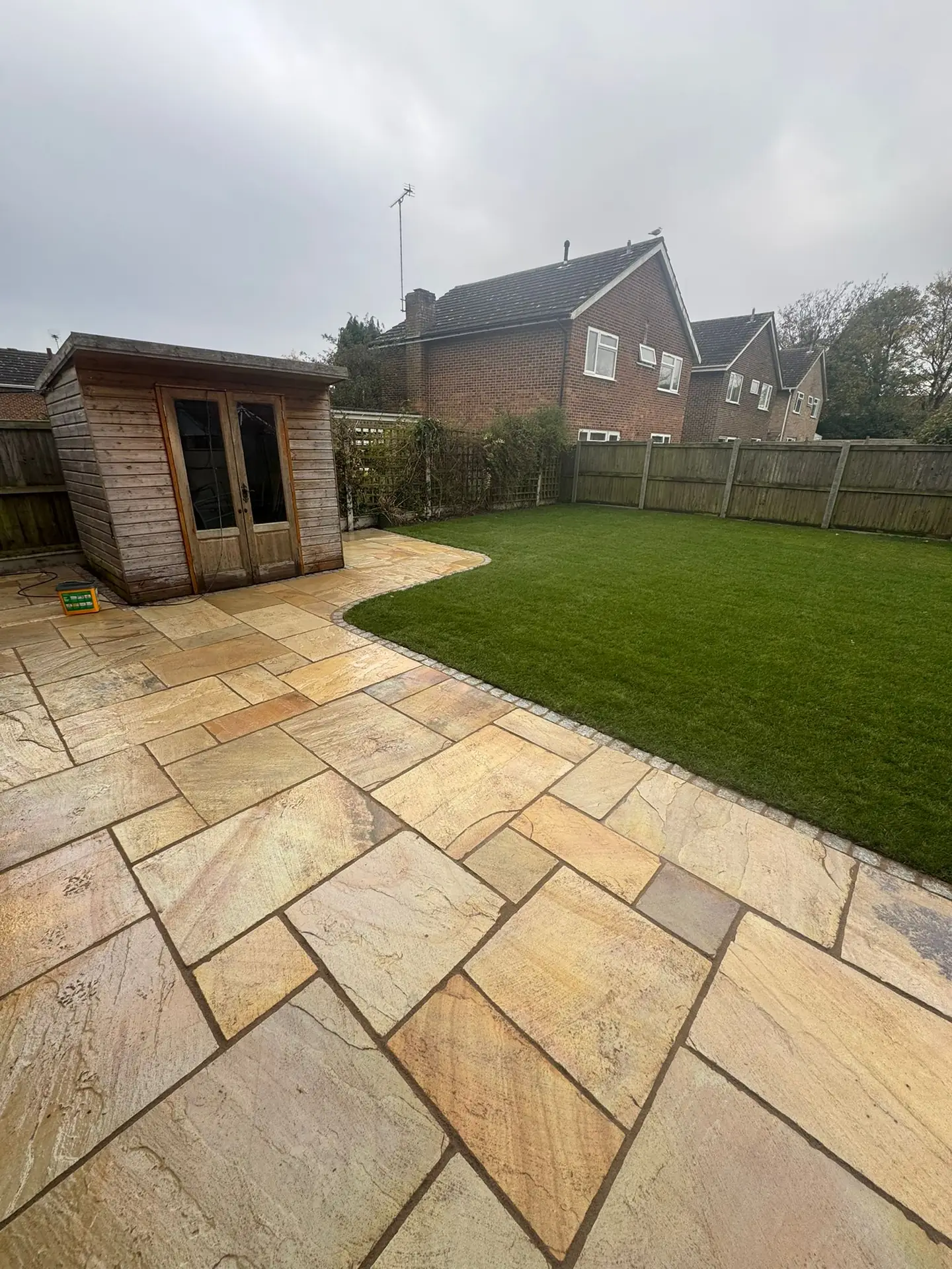 Artificial grass beside paving