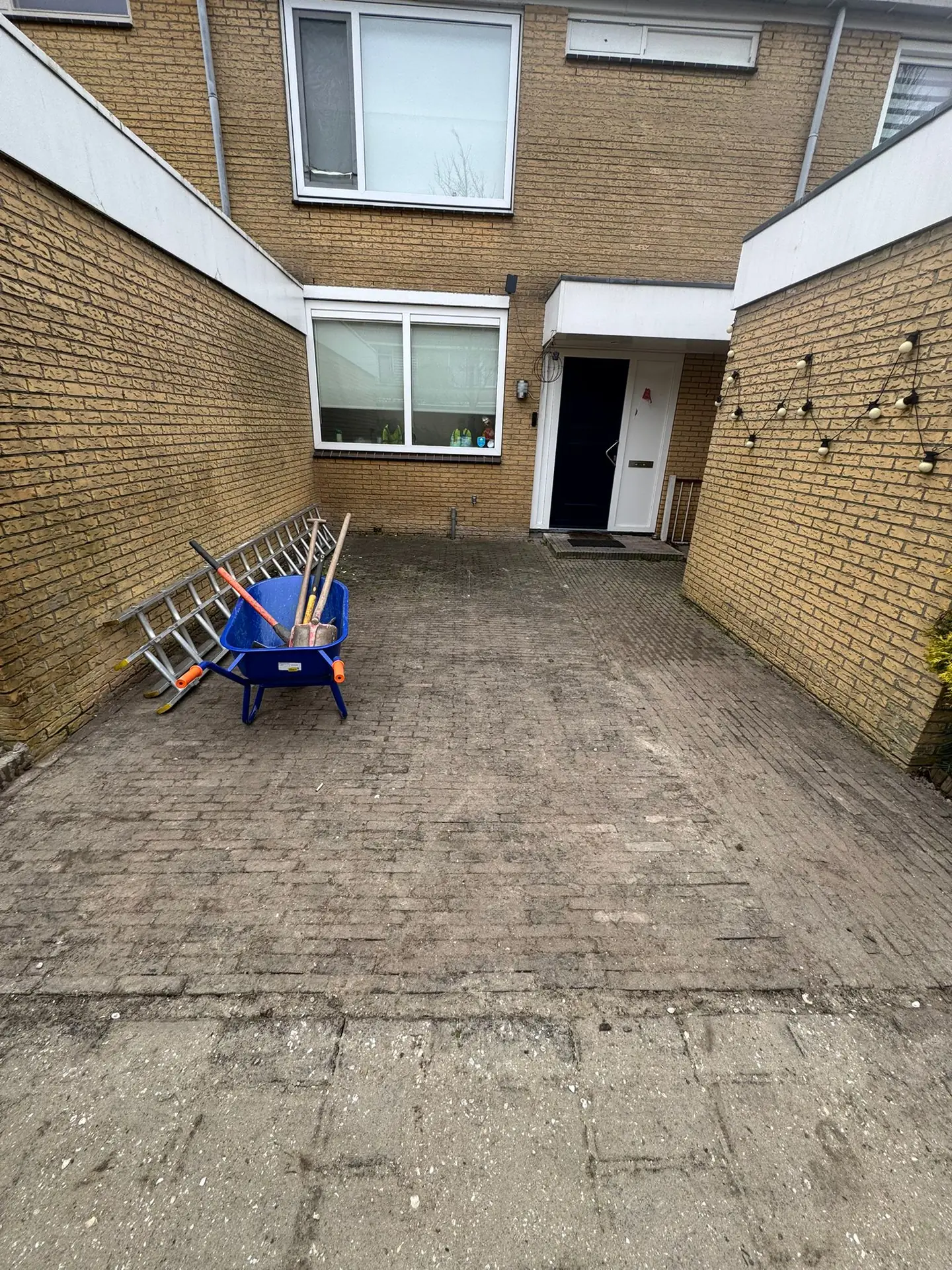 Paving beside a property entrance