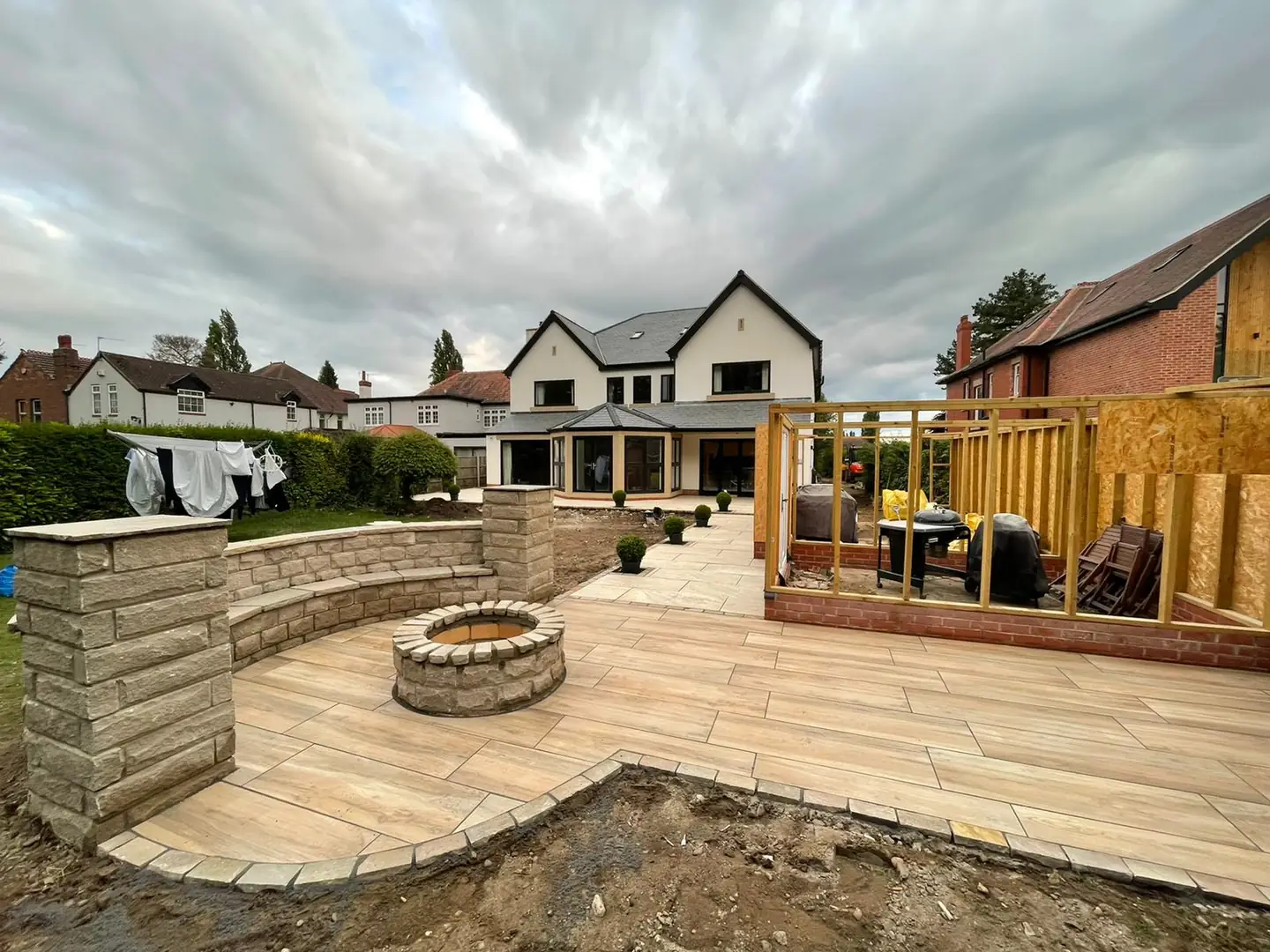 Paved patio area with garden seating