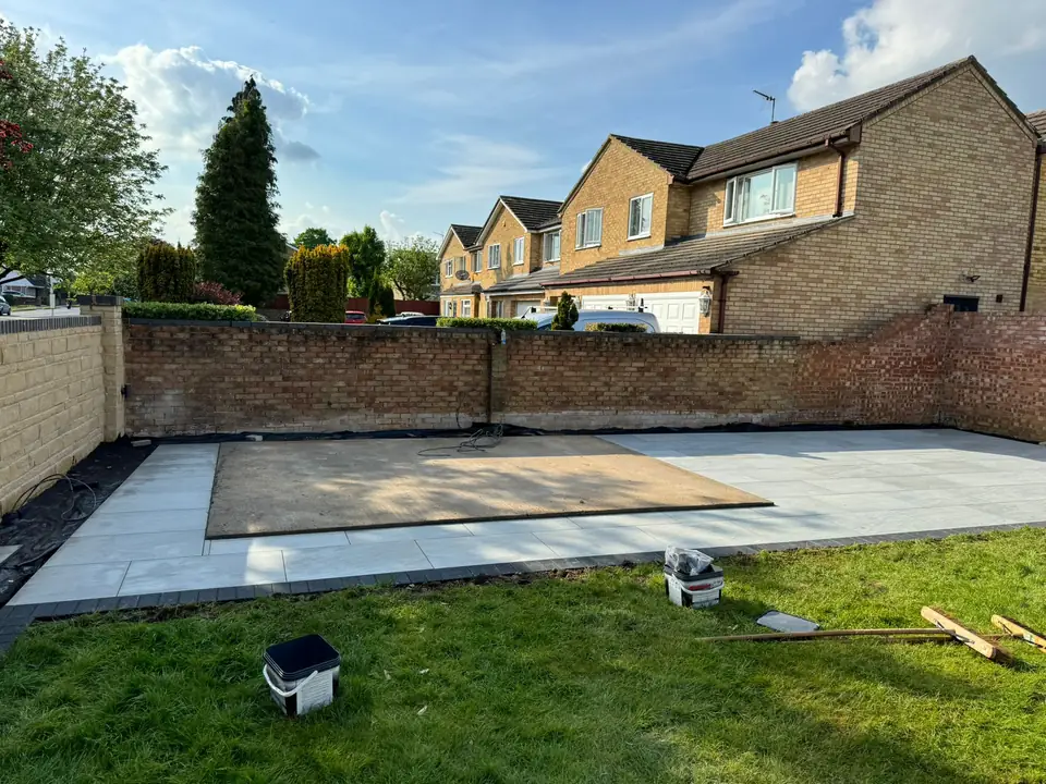 Modern porcelain patio design with large-format paving