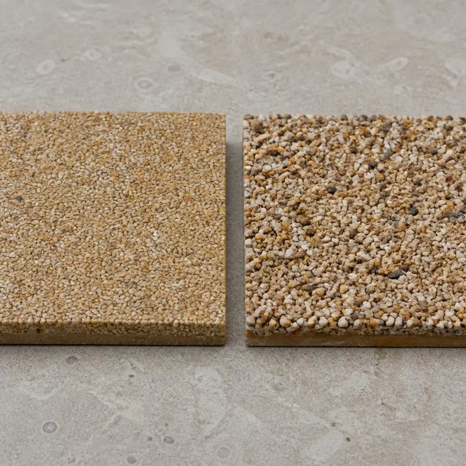 Two resin surfacing samples show bound aggregate beside loose aggregate on a resin layer