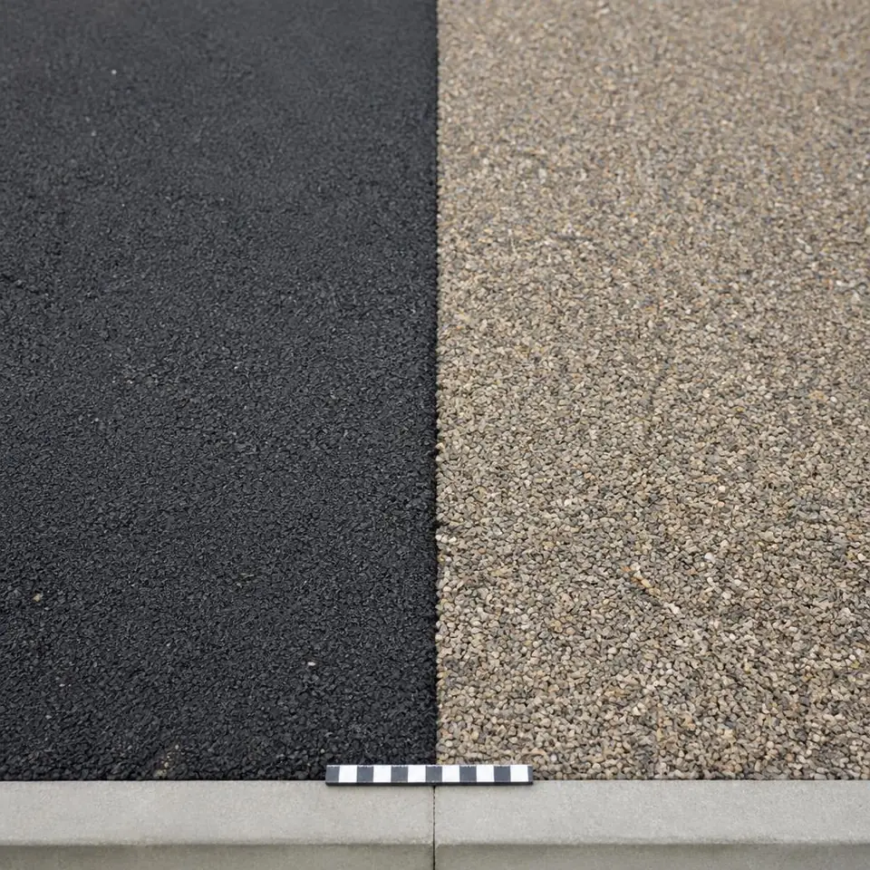 Dark tarmac and warm-grey resin-bound aggregate shown side by side
